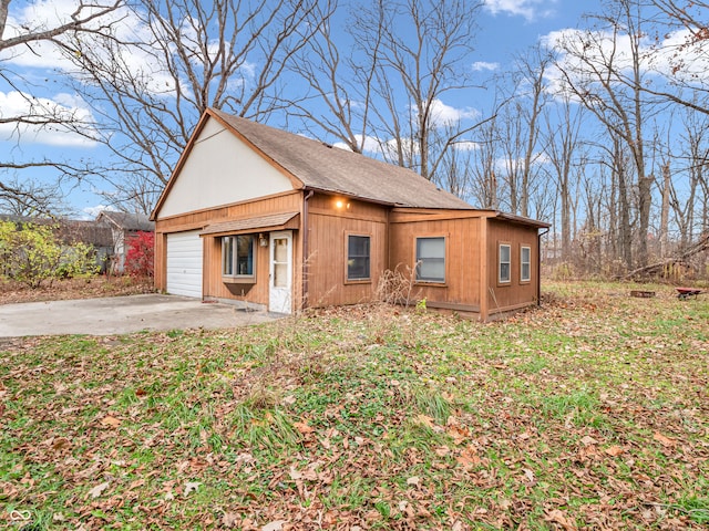 view of property exterior with a garage