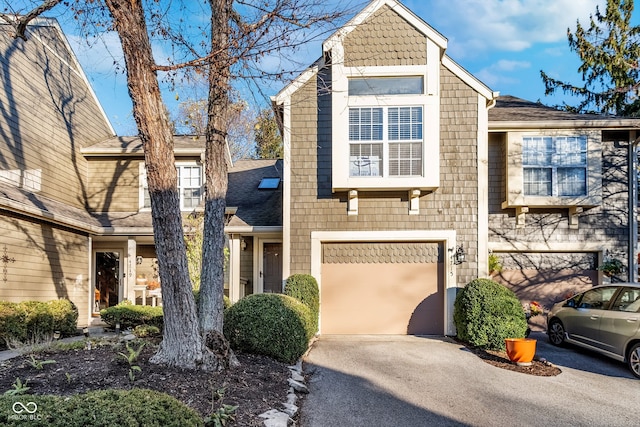 front of property with a garage