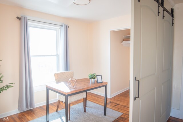 office area with hardwood / wood-style floors