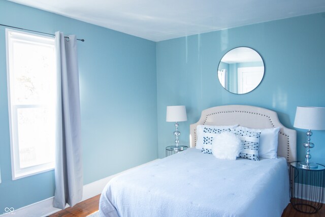 bedroom featuring hardwood / wood-style flooring