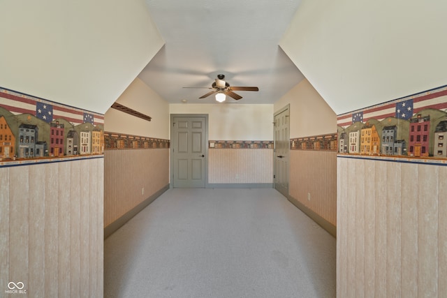 hallway featuring light carpet