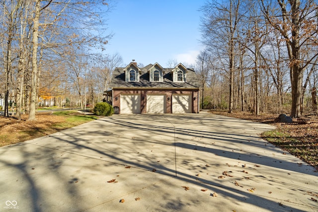 view of property exterior with a garage