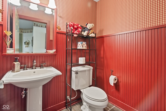 bathroom with toilet and sink