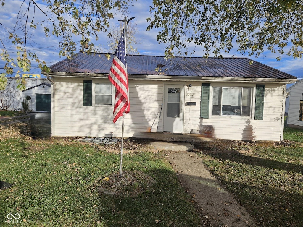 ranch-style house with a front yard