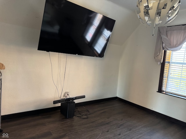 unfurnished living room featuring dark hardwood / wood-style flooring