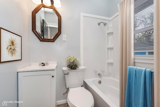 full bathroom with vanity, tub / shower combination, and toilet