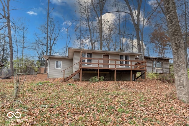 rear view of house with a deck