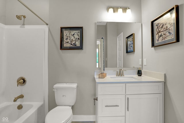 full bathroom featuring shower / bathing tub combination, vanity, and toilet