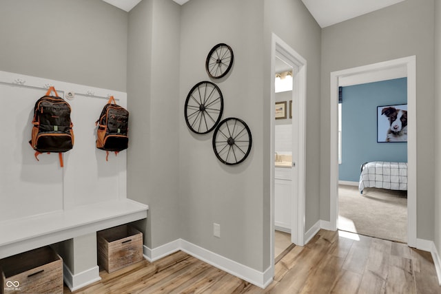 mudroom with light wood-type flooring