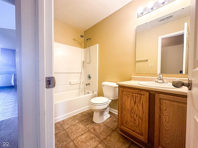 full bathroom with shower / tub combination, vanity, a textured ceiling, and toilet