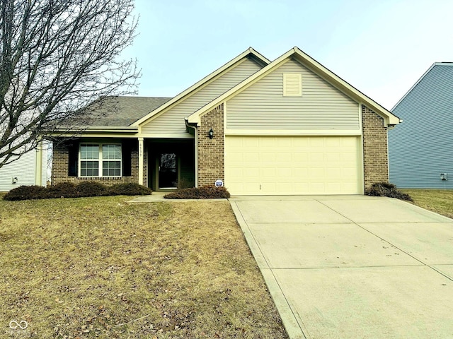 ranch-style home with a garage and a front lawn