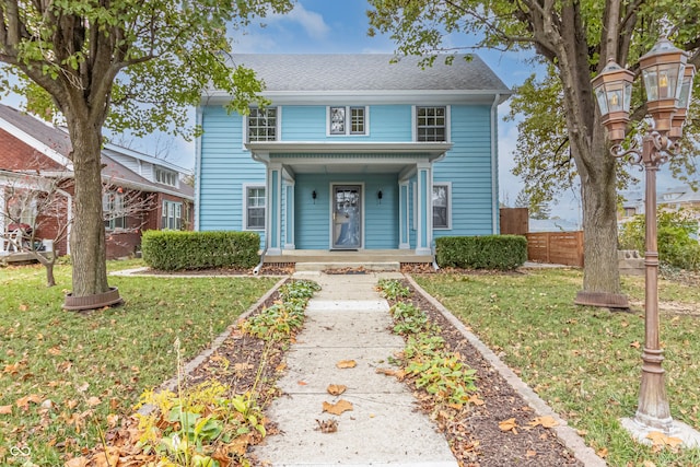 view of front of home featuring a front yard