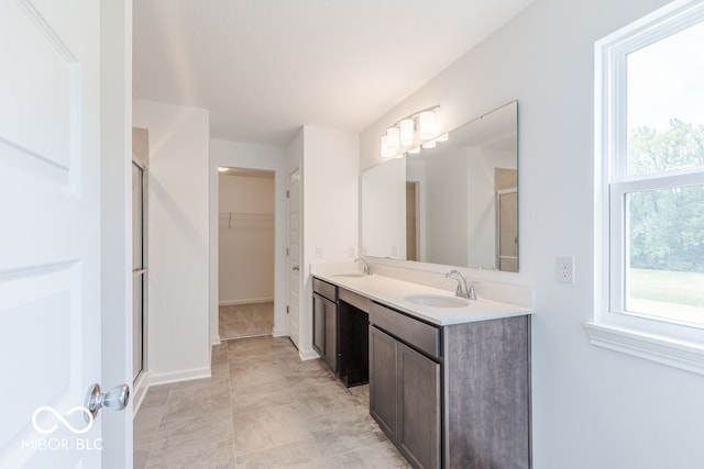 bathroom with vanity and an enclosed shower