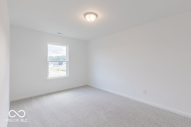 empty room with carpet floors