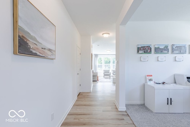 hall featuring light wood-type flooring