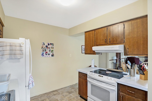 kitchen featuring white appliances