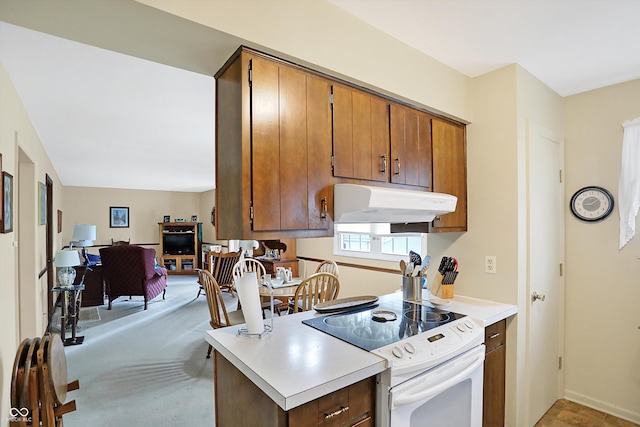 kitchen with white range with electric stovetop and light carpet