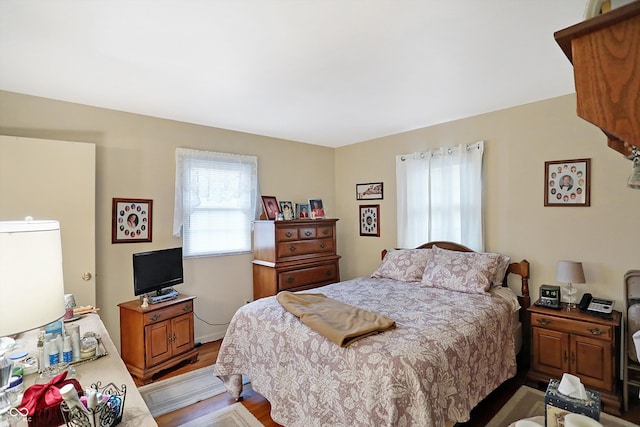 bedroom featuring light hardwood / wood-style flooring