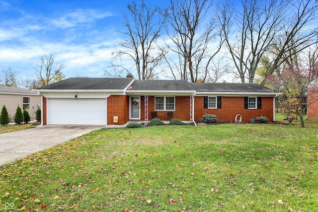 single story home featuring a front lawn and a garage