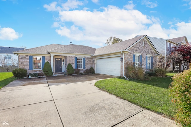 ranch-style home with a garage and a front lawn