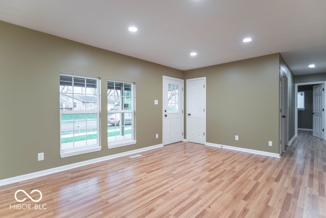 empty room featuring light hardwood / wood-style floors