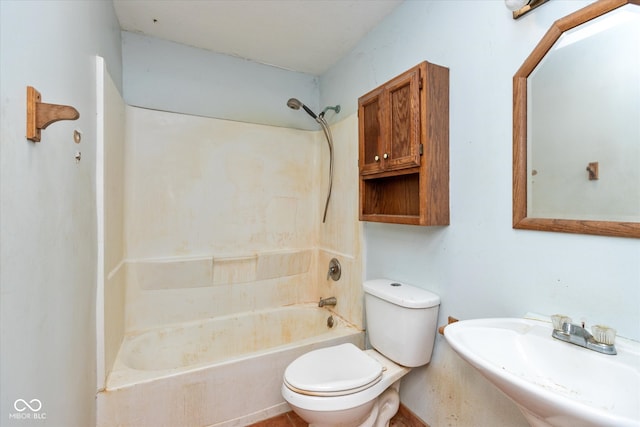 full bathroom featuring bathtub / shower combination, toilet, and sink