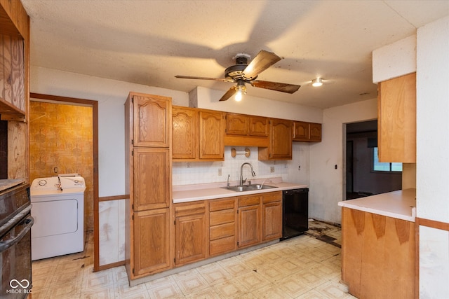 kitchen featuring black appliances, sink, ceiling fan, a textured ceiling, and washer / dryer