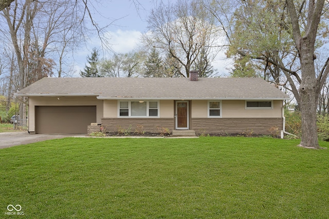 ranch-style home with a front lawn and a garage