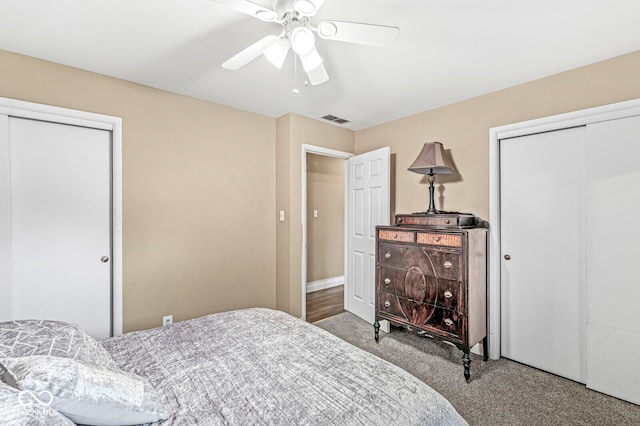 carpeted bedroom with ceiling fan