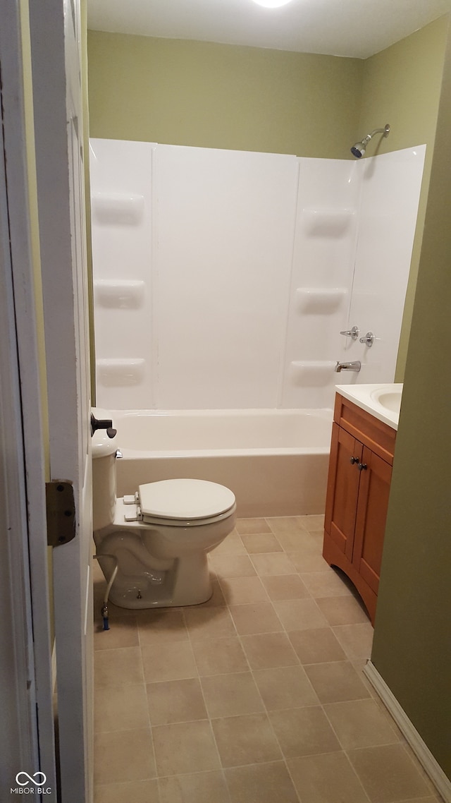 full bathroom featuring tile patterned floors, vanity, tub / shower combination, and toilet