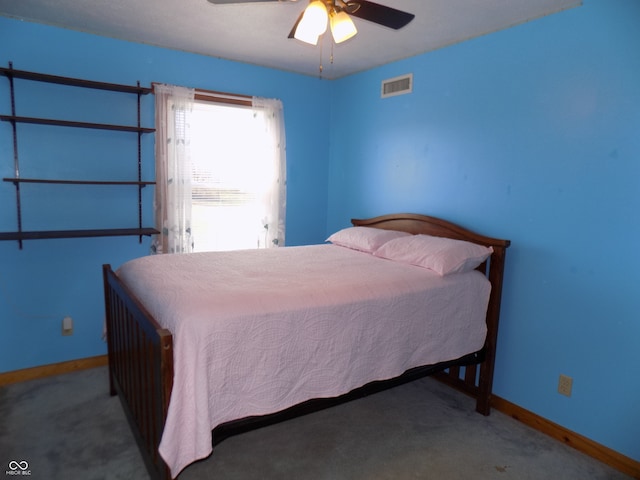 bedroom featuring ceiling fan and carpet floors