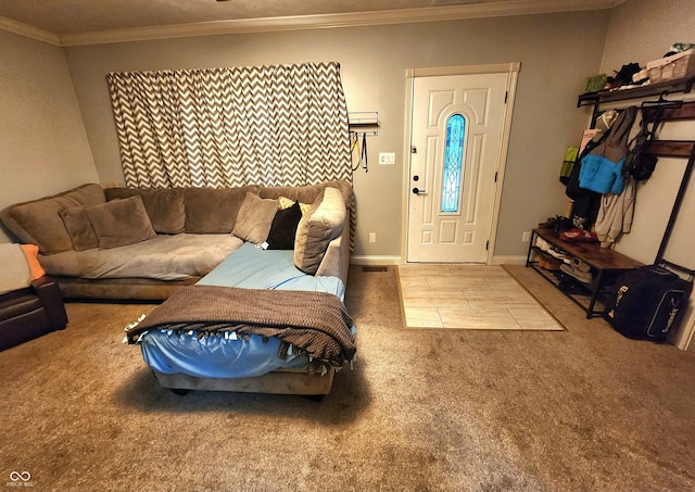 carpeted foyer entrance featuring crown molding