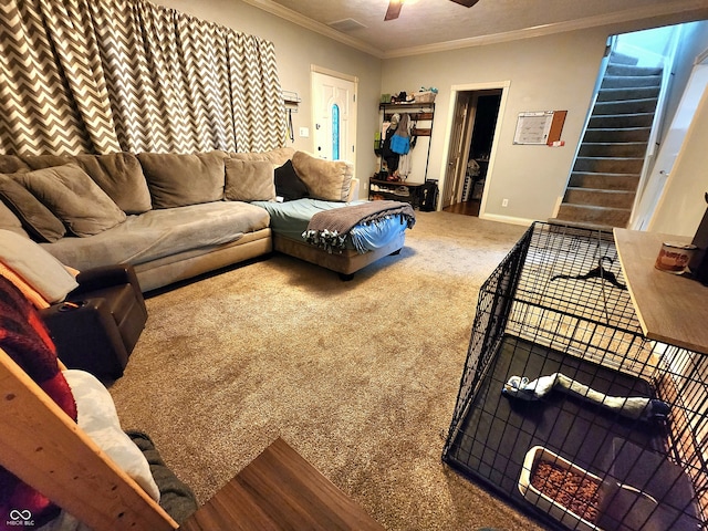 carpeted living room featuring ceiling fan and ornamental molding