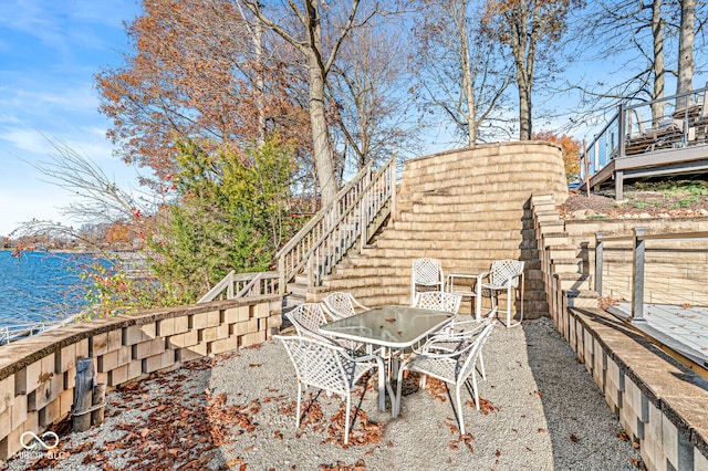 view of patio / terrace with a water view