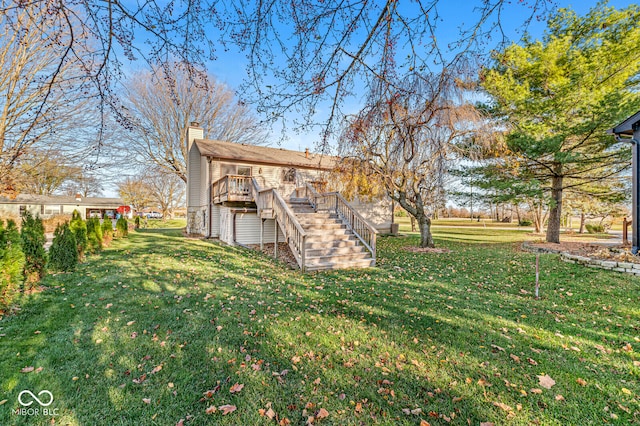 view of yard featuring a deck