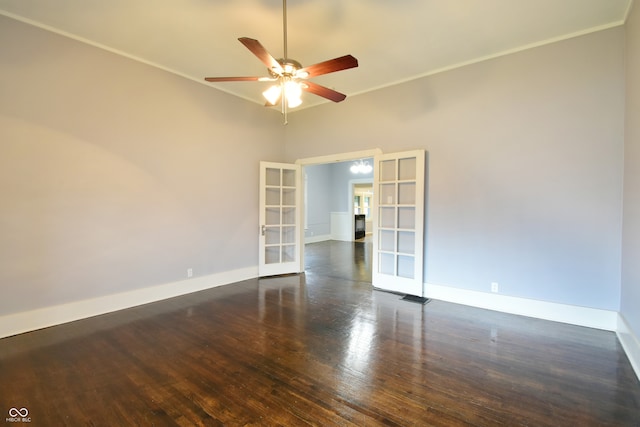 unfurnished room featuring french doors, dark hardwood / wood-style flooring, ceiling fan, and ornamental molding