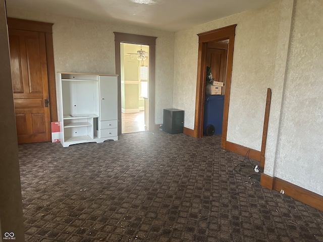 interior space with dark colored carpet