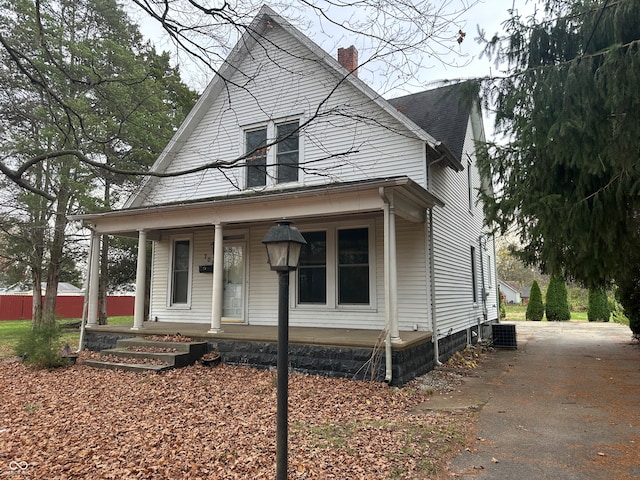 view of front of home featuring central AC and a porch