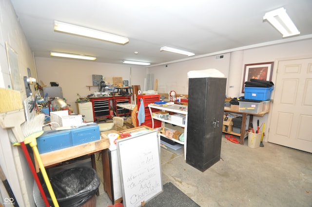 basement with a workshop area