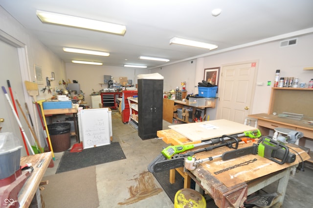 interior space featuring a workshop area