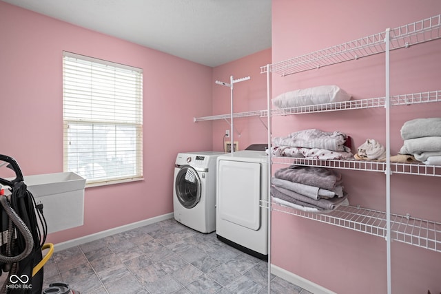 laundry area with washer and dryer