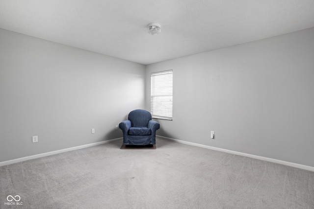 unfurnished room with carpet floors