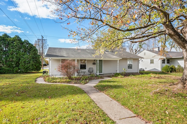 ranch-style house with a front lawn