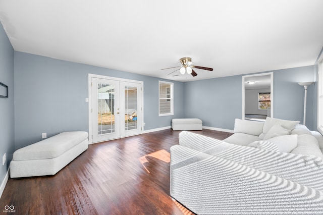 bedroom with ceiling fan, dark hardwood / wood-style floors, access to exterior, and french doors