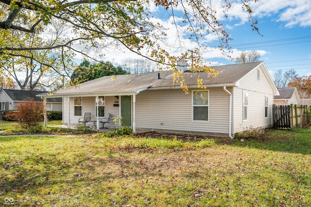 view of front of property with a front lawn