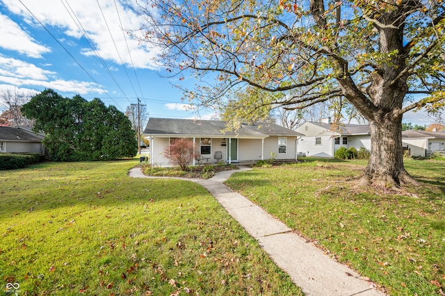 single story home with a front yard