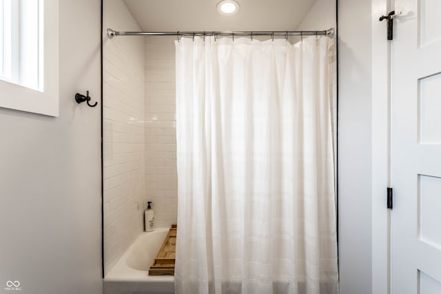 bathroom featuring shower / bath combo