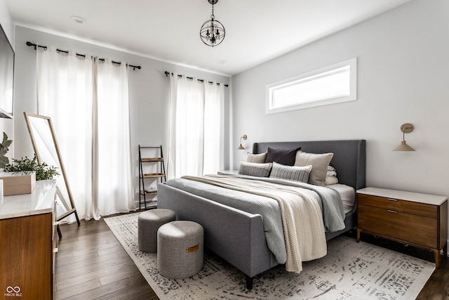 bedroom featuring dark hardwood / wood-style flooring