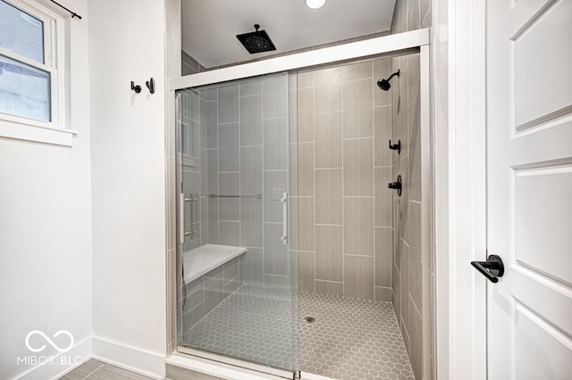 bathroom featuring an enclosed shower