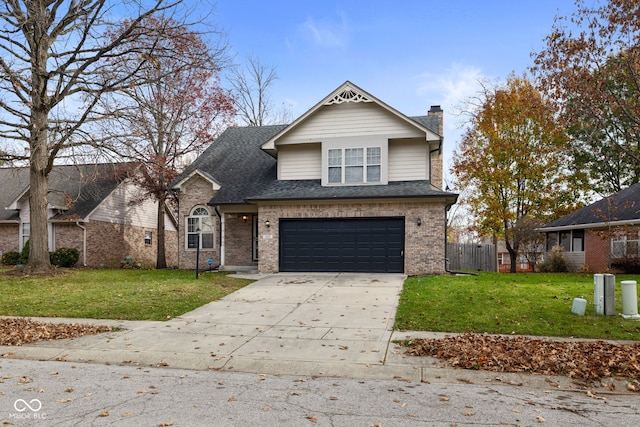 view of front of house featuring a front lawn and a garage